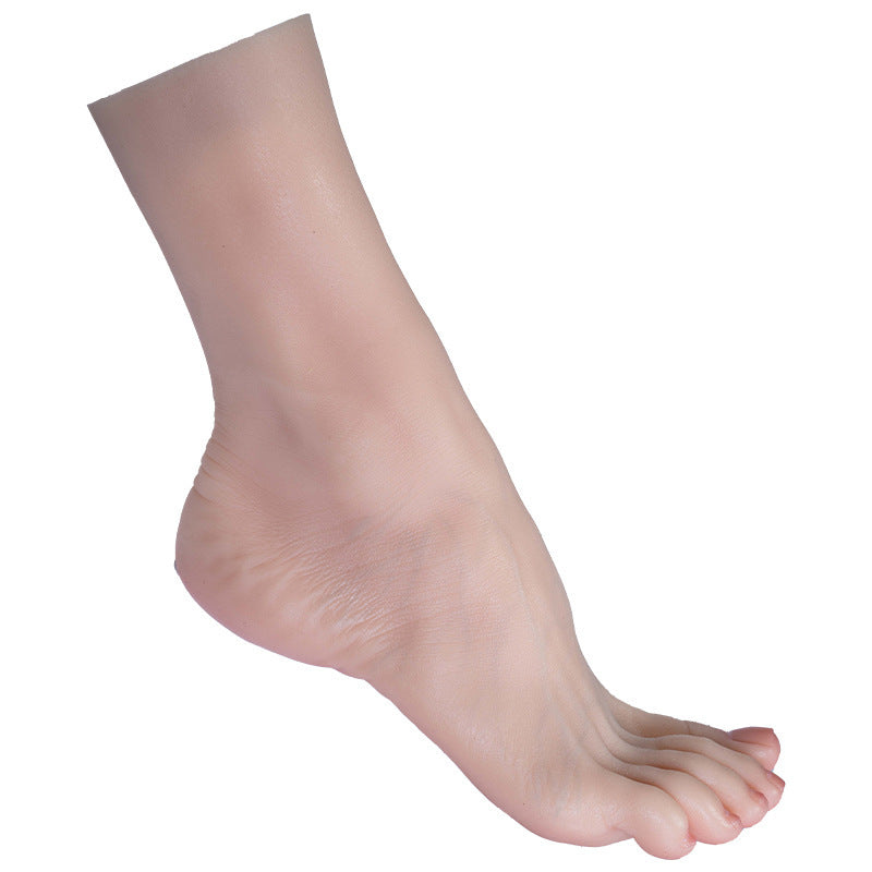 TG4001 silicone foot model showing its ankle, arch and toes on a white background
